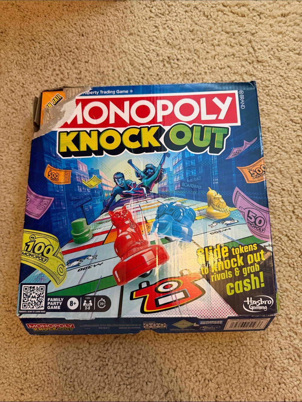 Monopoly Knock Out Family Game by Hasbro - Red, Blue, Green, Yellow